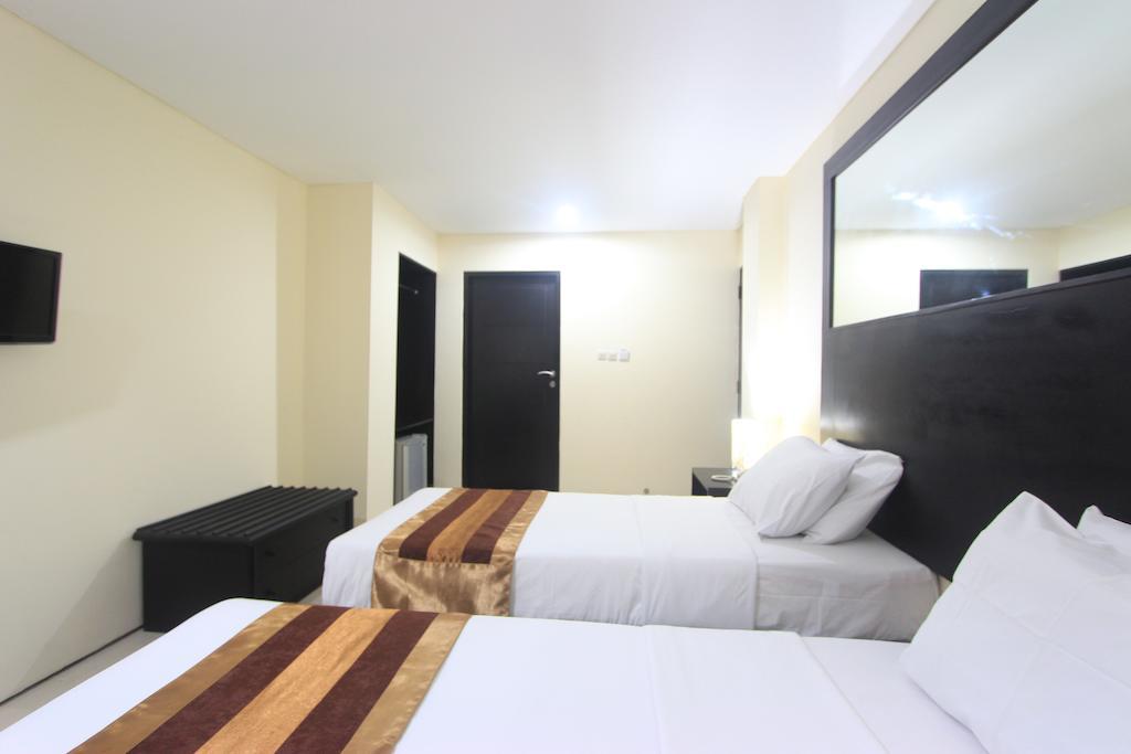 Airport Kuta Hotel And Residences Tuban  Room photo